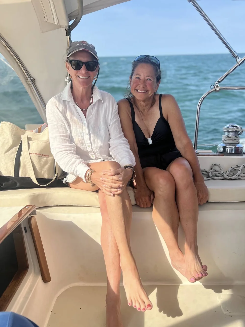 Guests relaxing in the cockpit aboard Our Passion