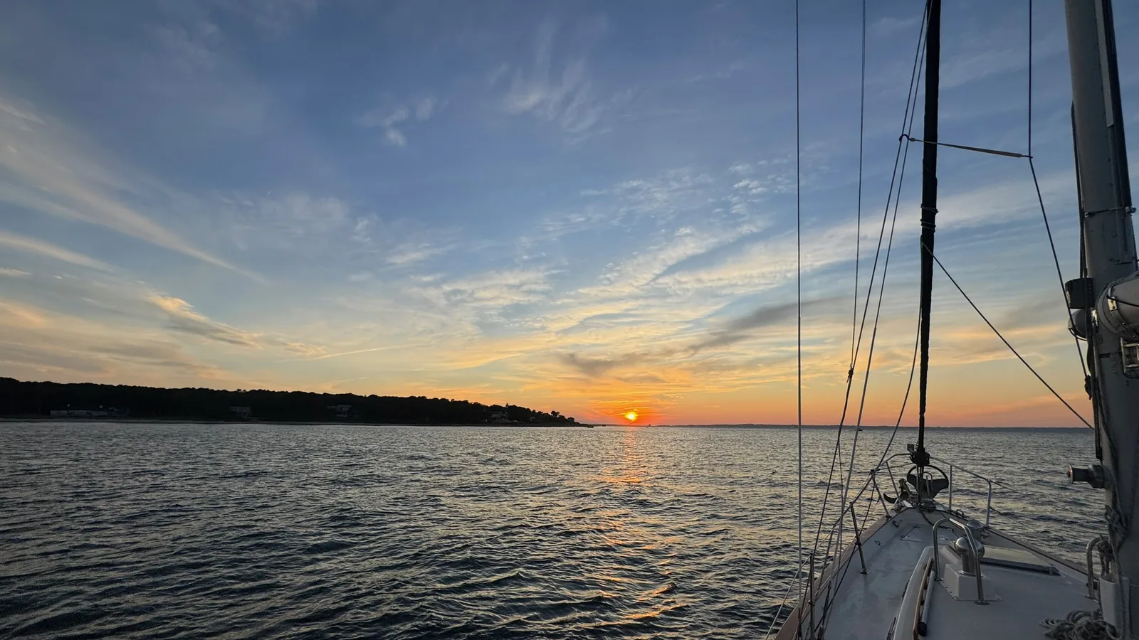 Sunset sail along the Mattapoisett shoreline aboard Our Passion